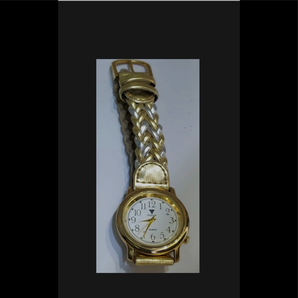 Focus Quartz Watch- Needs Battery, rope Band has sone wear.